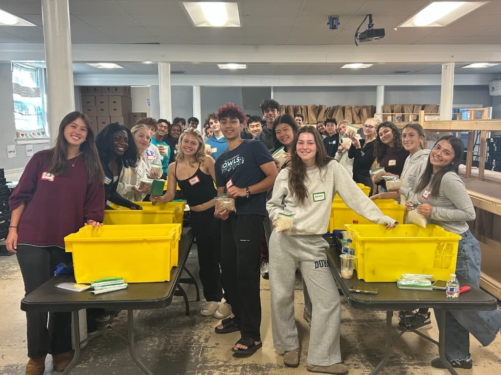 DSP brothers volunteering at a food bank
